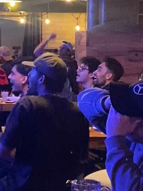 Fans shouting at the screen during the Miami Grand Prix