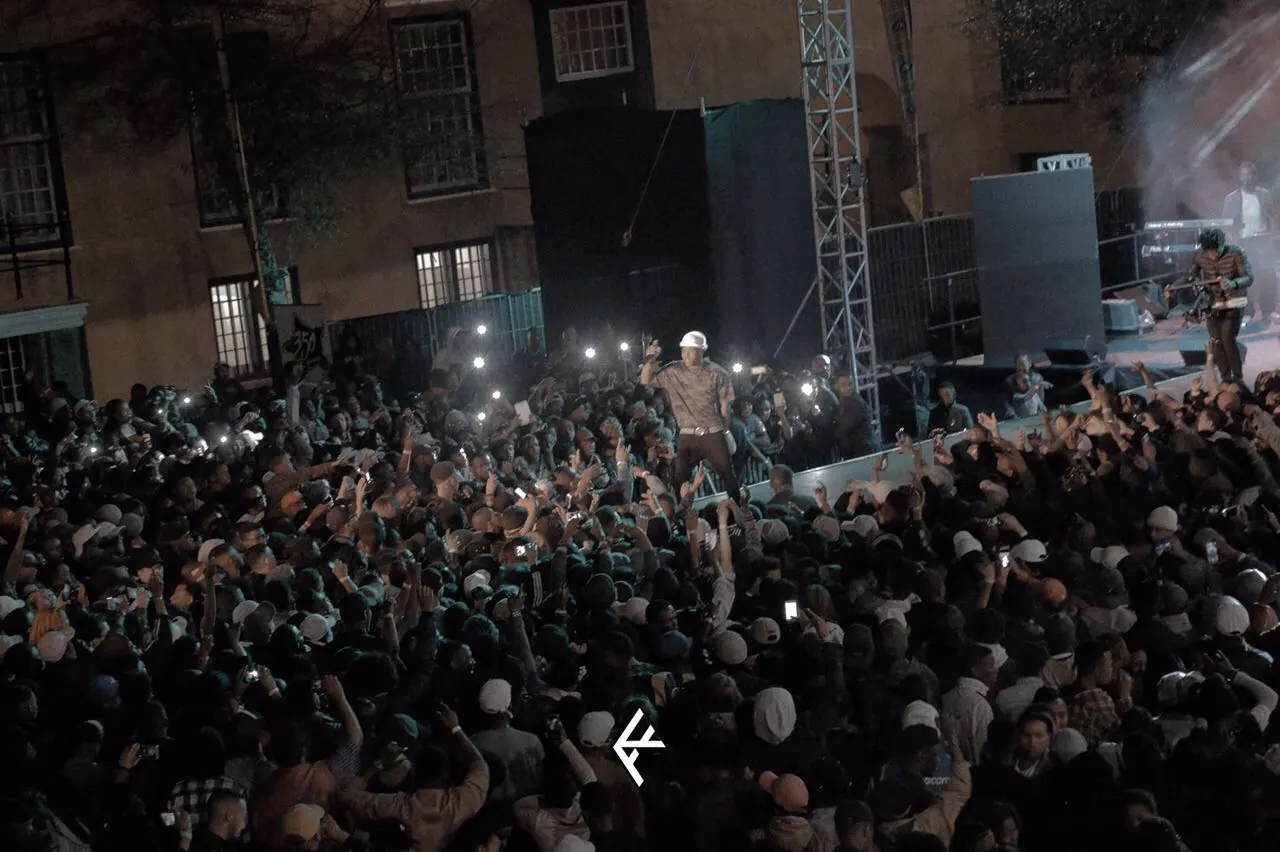A packed night crowd with phone lights up for Nasty C, a Mabala Noise artist