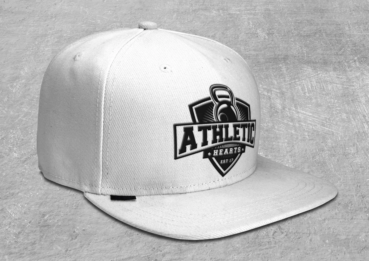 White snapback cap with the Athletic Hearts logo