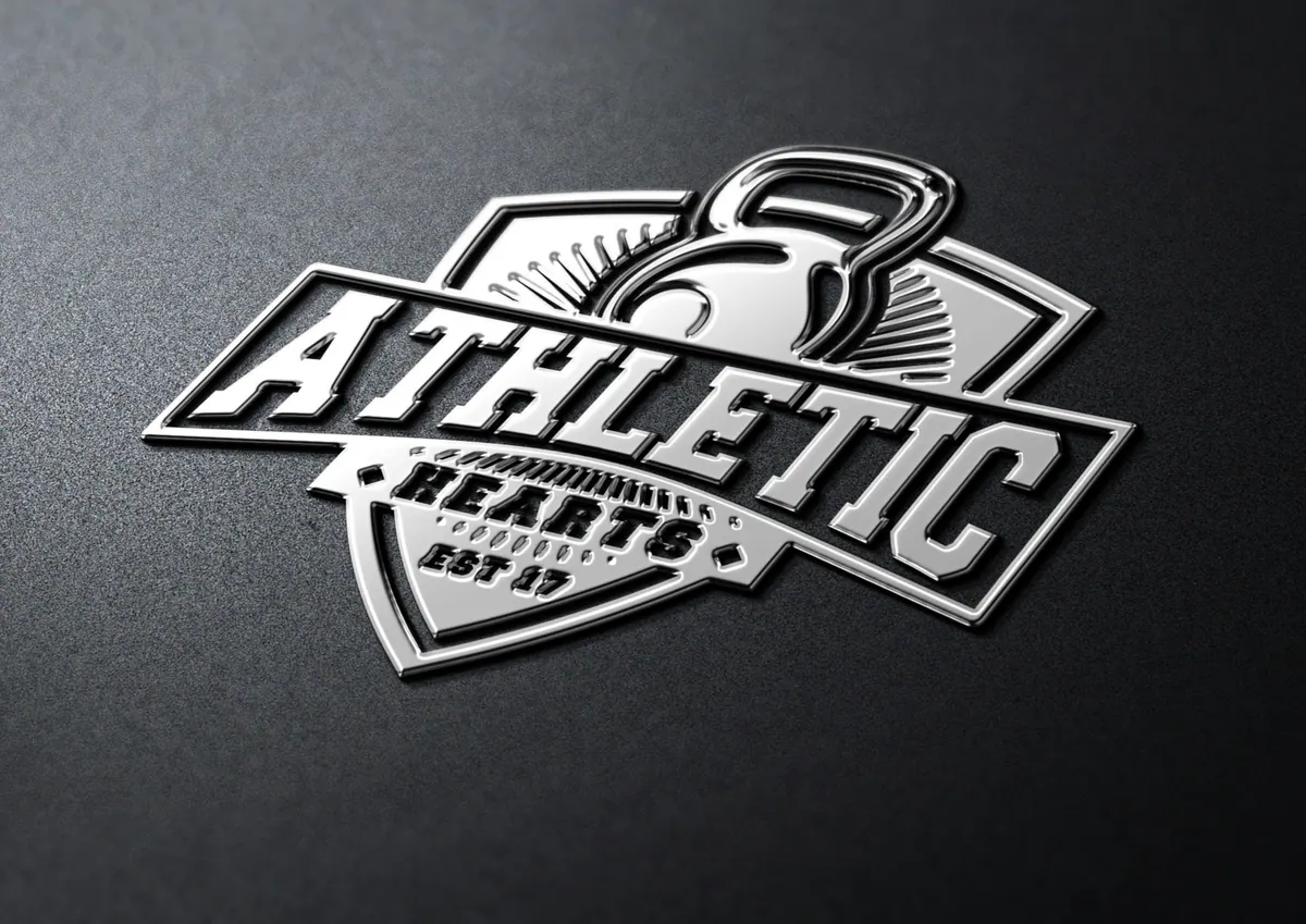 Chrome Athletic Hearts badge embossed on a dark surface