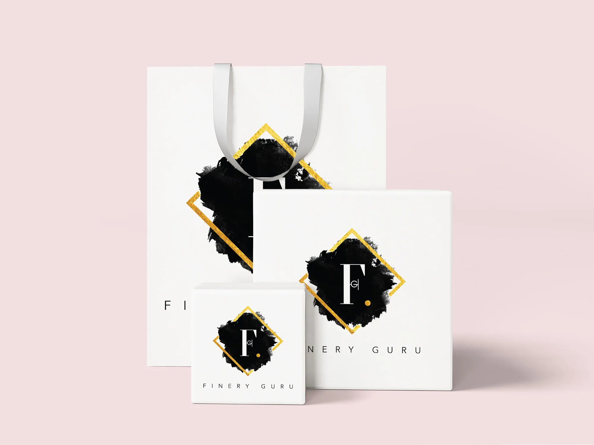 Finery Guru shopping bags and gift boxes on a pink background