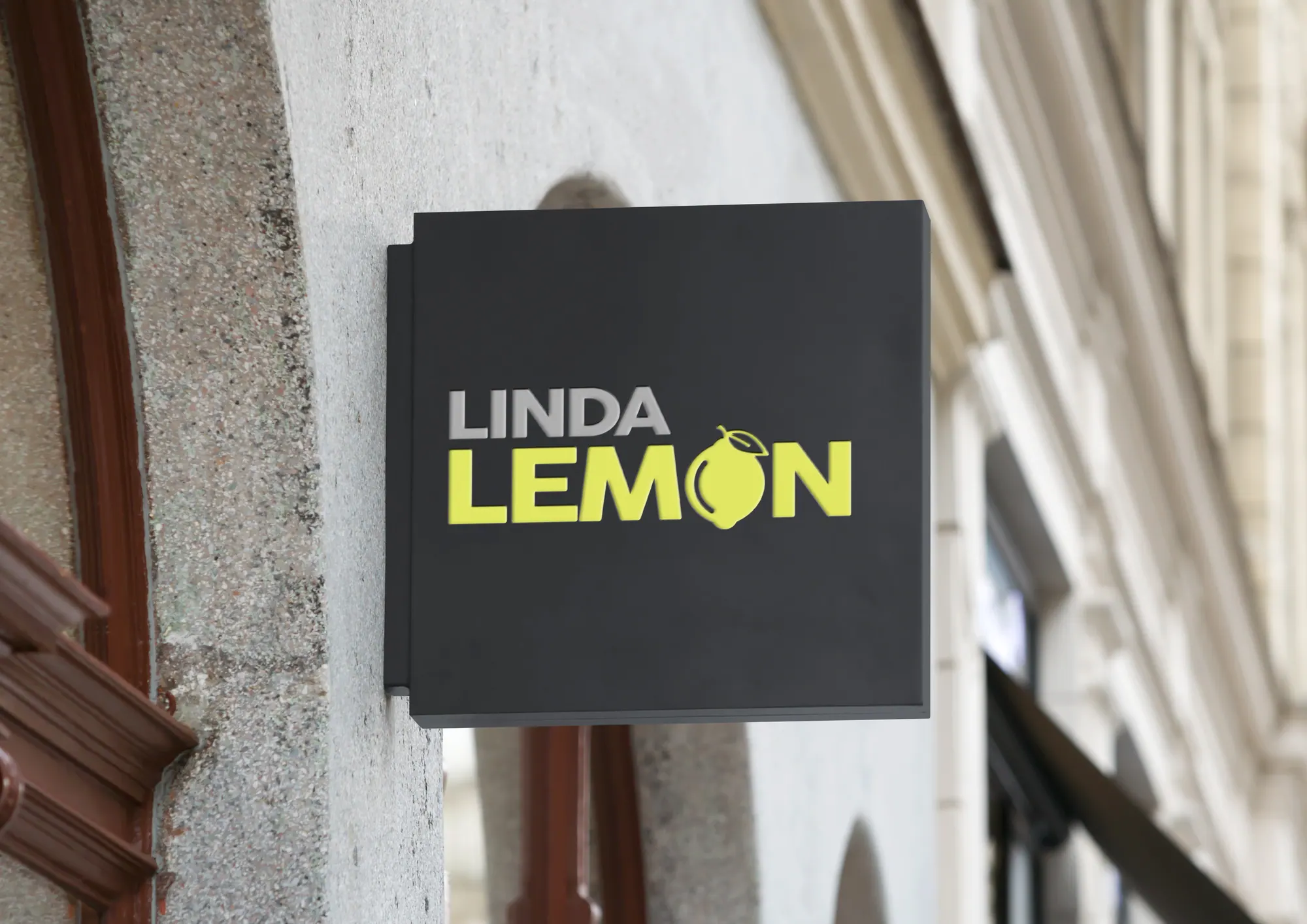 Linda Lemon logo on a black wall-mounted sign