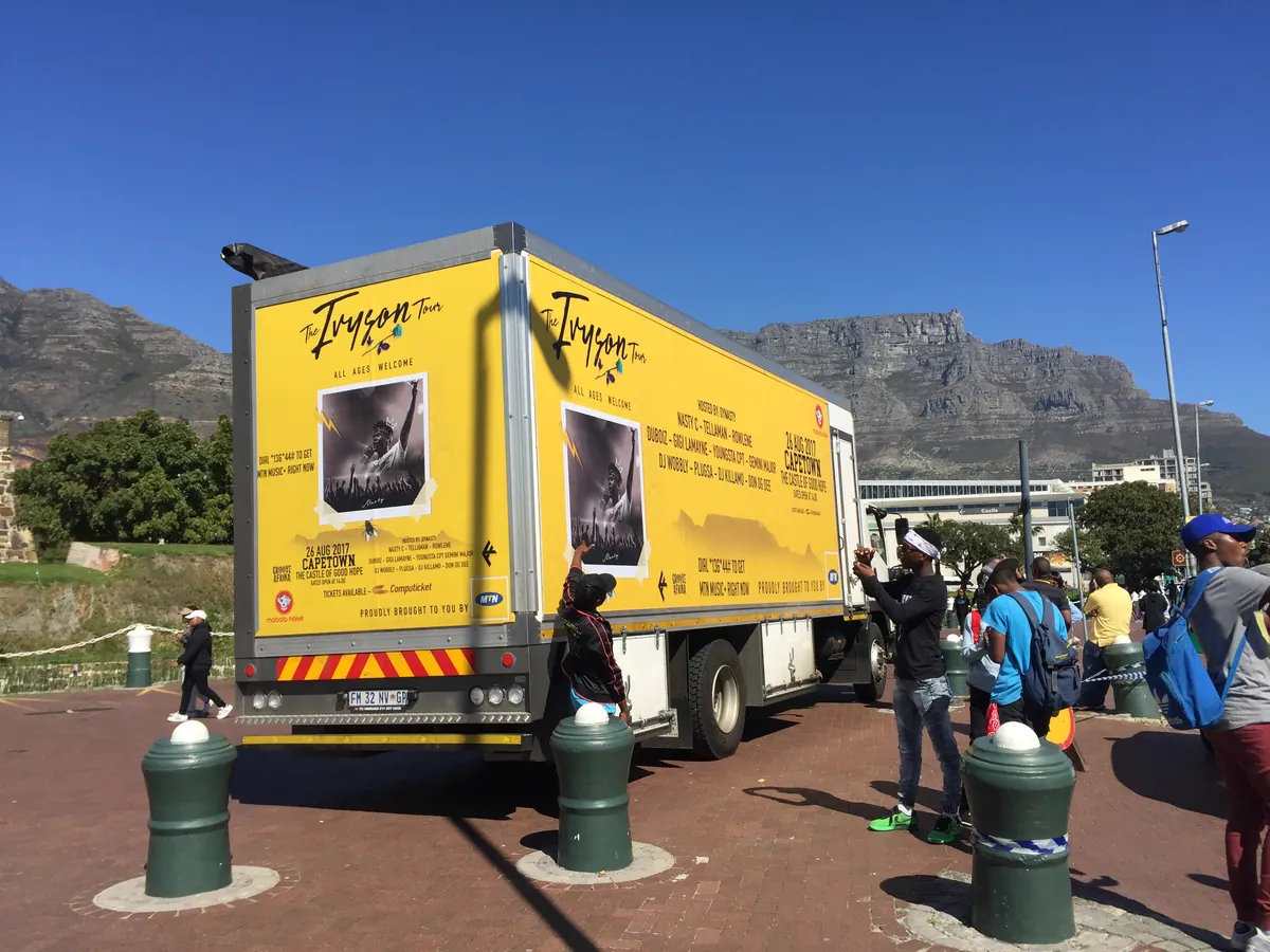 Branded Ivyson Tour truck with fans outside the Castle of Good Hope