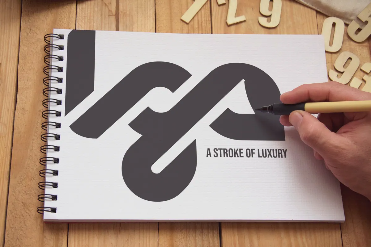 LGA A Stroke of Luxury logo drawn in a sketchbook
