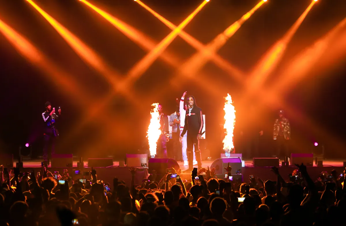 Migos on stage with pyrotechnics at the Culture Tour in South Africa