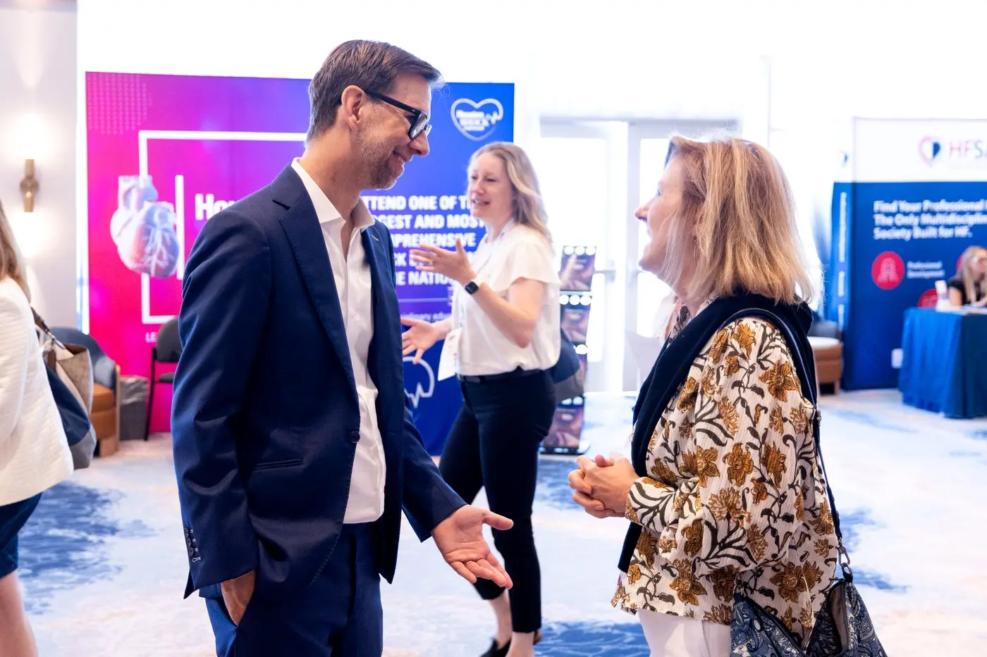 Michael Kutcher meeting audience members after a keynote
